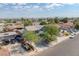 Scenic aerial shot of a home in a neighborhood with mature trees at 401 Altamira Rd, Las Vegas, NV 89145