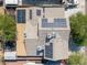 Birds-eye view of a home with solar panels on the roof and a shed in the backyard at 401 Altamira Rd, Las Vegas, NV 89145