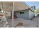 A covered back patio with desert landscaping at 401 Altamira Rd, Las Vegas, NV 89145