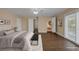 Staged main bedroom showing multiple entryways, plank floor and bright windows at 401 Altamira Rd, Las Vegas, NV 89145