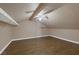 A spacious bonus room with wood-look flooring, a ceiling fan, and neutral wall color at 401 Altamira Rd, Las Vegas, NV 89145