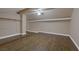 A spacious bonus room with wood-look flooring, a ceiling fan, and ample closet space for versatile use at 401 Altamira Rd, Las Vegas, NV 89145