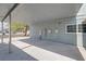 Spacious carport area featuring sturdy posts and a well-maintained concrete floor at 401 Altamira Rd, Las Vegas, NV 89145
