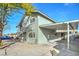 Charming two-story home with a well-kept carport and landscaped yard at 401 Altamira Rd, Las Vegas, NV 89145