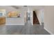 Open-concept floor plan seamlessly connects living room, stairs and kitchen at 401 Altamira Rd, Las Vegas, NV 89145