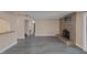 Open living area offering hardwood floors, a tiled fireplace, and plantation shutters for bright natural light at 401 Altamira Rd, Las Vegas, NV 89145