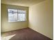 A cozy bedroom showcasing natural light from the window at 4338 Caliente St # 15, Las Vegas, NV 89119