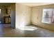 Sunlit living room featuring neutral tile floors and window at 4338 Caliente St # 15, Las Vegas, NV 89119