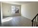 Bright, open living space featuring tiled floors and neutral walls at 4338 Caliente St # 15, Las Vegas, NV 89119