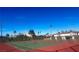A community tennis court with lighting and a view at 4338 Caliente St # 15, Las Vegas, NV 89119