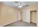 Bedroom with neutral walls, a ceiling fan, and closet at 4593 Weitzman Pl, Las Vegas, NV 89141