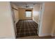 Neutral bedroom featuring a ceiling fan and patterned carpet at 4593 Weitzman Pl, Las Vegas, NV 89141