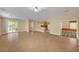 Spacious living room with tile floors and sliding glass doors to the outdoor area at 4593 Weitzman Pl, Las Vegas, NV 89141