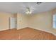 Spacious primary bedroom has hardwood floors and lots of light at 4593 Weitzman Pl, Las Vegas, NV 89141