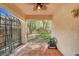 Covered patio offers a relaxing outdoor space with views of the landscaped backyard at 4593 Weitzman Pl, Las Vegas, NV 89141