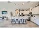 Contemporary kitchen with white cabinetry, pendant lighting, and ample counter space at 4708 Mindful St, North Las Vegas, NV 89031
