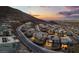 Expansive aerial view of hillside homes in Nevada showcasing desert landscaping and panoramic cityscape views at 522 Riley Ridge Ct, Henderson, NV 89012