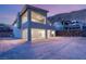 Beautiful backyard view showcasing the home's modern architecture, landscape, and outdoor space at 522 Riley Ridge Ct, Henderson, NV 89012