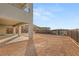 Large backyard with a covered patio, offering privacy and scenic views at 522 Riley Ridge Ct, Henderson, NV 89012