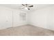 Bedroom with ceiling fan and neutral carpet at 522 Riley Ridge Ct, Henderson, NV 89012