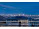 Enjoy panoramic city views from this multi-story home featuring solar panels at 522 Riley Ridge Ct, Henderson, NV 89012