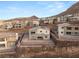 Nevada hillside home featuring desert landscaping, retaining walls, and views of surrounding mountain community at 522 Riley Ridge Ct, Henderson, NV 89012