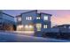 Charming two-story home featuring a three-car garage and stone accents, set on a well-manicured lot at 522 Riley Ridge Ct, Henderson, NV 89012