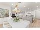 Open-concept kitchen with a large island, modern appliances, and a seamless flow to the living area at 522 Riley Ridge Ct, Henderson, NV 89012