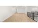 Open upstairs area with neutral-toned flooring and railings at 522 Riley Ridge Ct, Henderson, NV 89012