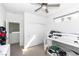 This carpeted bedroom features a bunk bed, closet, and ceiling fan for modern comfort at 524 Grand Cascade Pl, North Las Vegas, NV 89084