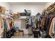 Walk-in closet with shelving, hanging racks, and ample storage space for clothes and accessories at 524 Grand Cascade Pl, North Las Vegas, NV 89084