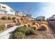 Landscaped community park area with bench seating and native plants at 524 Grand Cascade Pl, North Las Vegas, NV 89084