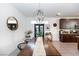 Open dining area with elegant light fixture and stylish décor at 524 Grand Cascade Pl, North Las Vegas, NV 89084