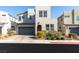 Contemporary two-story home with a two-car garage and desert landscaping at 524 Grand Cascade Pl, North Las Vegas, NV 89084