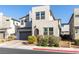 Contemporary two-story home with desert landscaping and a tile roof at 524 Grand Cascade Pl, North Las Vegas, NV 89084
