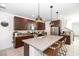 Contemporary kitchen with sleek cabinetry, center island, and modern appliances at 524 Grand Cascade Pl, North Las Vegas, NV 89084