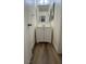Bathroom showcasing a vanity with new fixtures and wood-look flooring at 567 Roxella Ln # D, Las Vegas, NV 89110