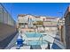 Enjoy a fantastic community pool and spa with nearby seating at 6434 Spring Jog St, Las Vegas, NV 89166