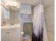 Well-lit bathroom featuring modern fixtures, subway tiles, and coordinated accessories at 645 Utah St, Boulder City, NV 89005