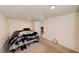 Cozy bedroom featuring neutral carpeting, and a view into another room at 645 Utah St, Boulder City, NV 89005