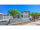 Home featuring a quaint design and meticulously maintained landscaping at 645 Utah St, Boulder City, NV 89005