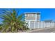Home exterior showing fenced yard and a partial view of the house at 645 Utah St, Boulder City, NV 89005