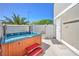 Relaxing patio with a hot tub, and an enclosed fence at 645 Utah St, Boulder City, NV 89005