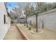 Backyard with patio and mature trees at 657 Burton St, Henderson, NV 89015