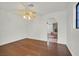Open-concept living space features hardwood floors and neutral walls at 657 Burton St, Henderson, NV 89015