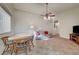 Spacious living room with tile floors and dining nook featuring plentiful natural light at 6629 Celeste Ave, Las Vegas, NV 89107