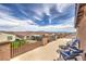The outdoor patio has a mountain view with lounging furniture to enjoy the sky view at 6904 Baylor Creek St, North Las Vegas, NV 89086
