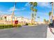 Sunhampton Residences gated community exterior view showing landscaping and palm trees at 7061 Roscoe Ave # 201, Las Vegas, NV 89129