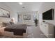 Comfortable main bedroom with a king-size bed, soft carpet, and serene decor at 7138 Sixshooter Dr, Las Vegas, NV 89119