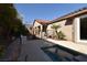 Well-maintained backyard with a partial view of the pool, perfect for outdoor entertaining and relaxation at 7325 Rustic Crest St, Las Vegas, NV 89149